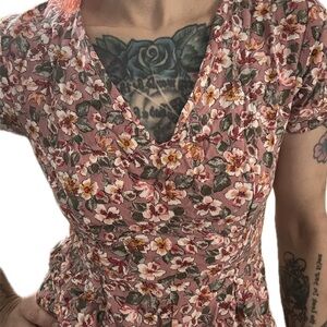 Adorable floral romper with peekaboo back